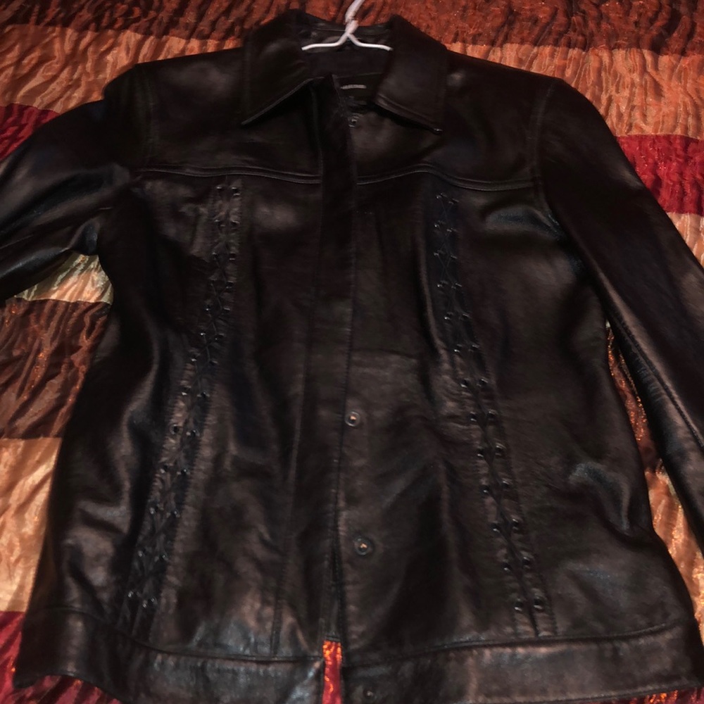 Cute waist length jacket faux leather. If interested make me an offer.
